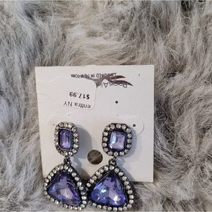 Designed in New York crystal ENTTRA Post at back I